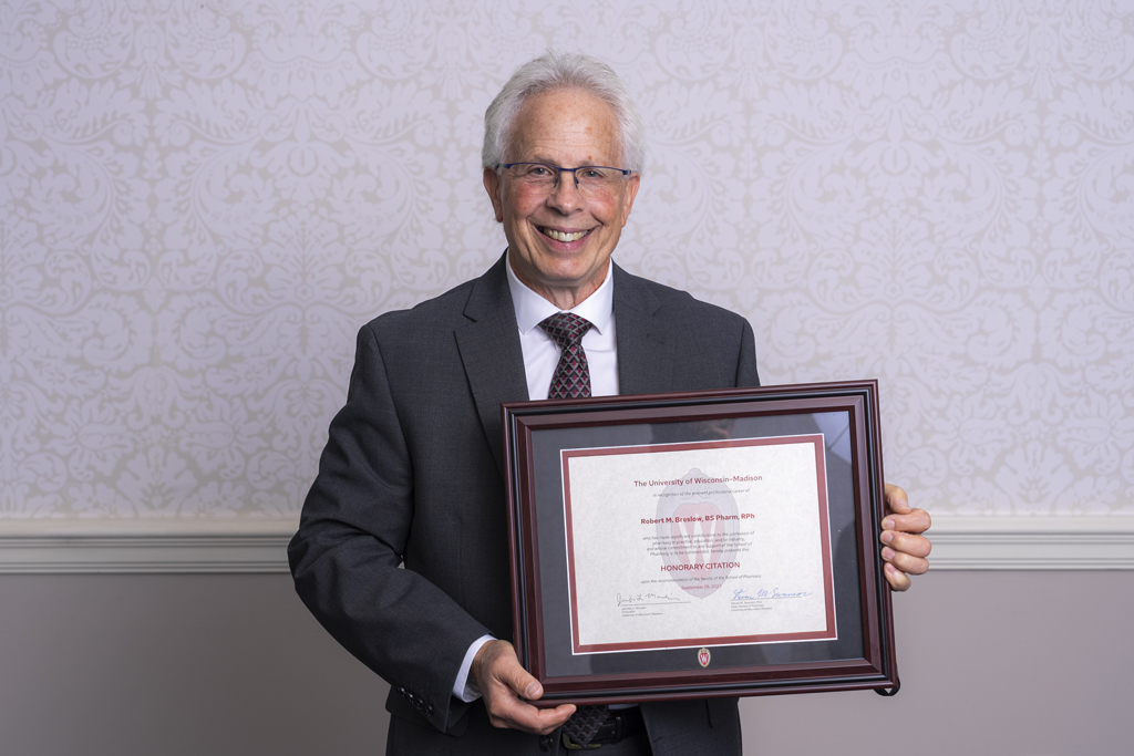 Bob Breslow poses with his 2023 Citation of Merit Award.