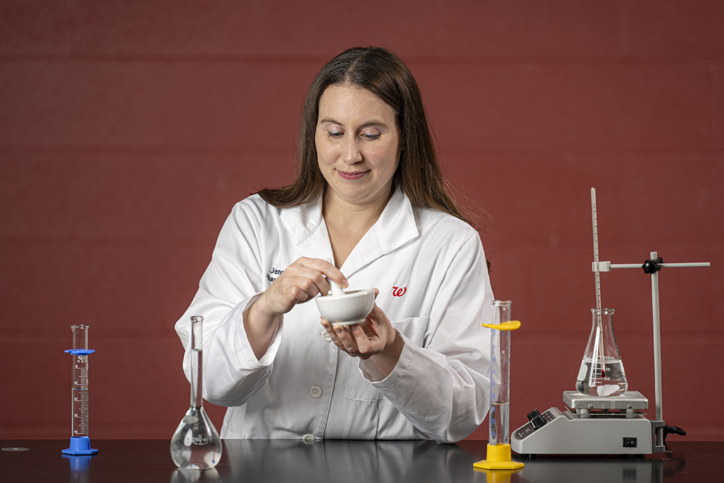 Jenny Donar working with pharmacy equipment