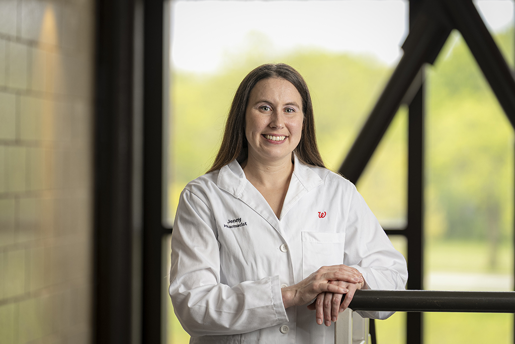 Jenny Donar portrait in front of a window in a white coat
