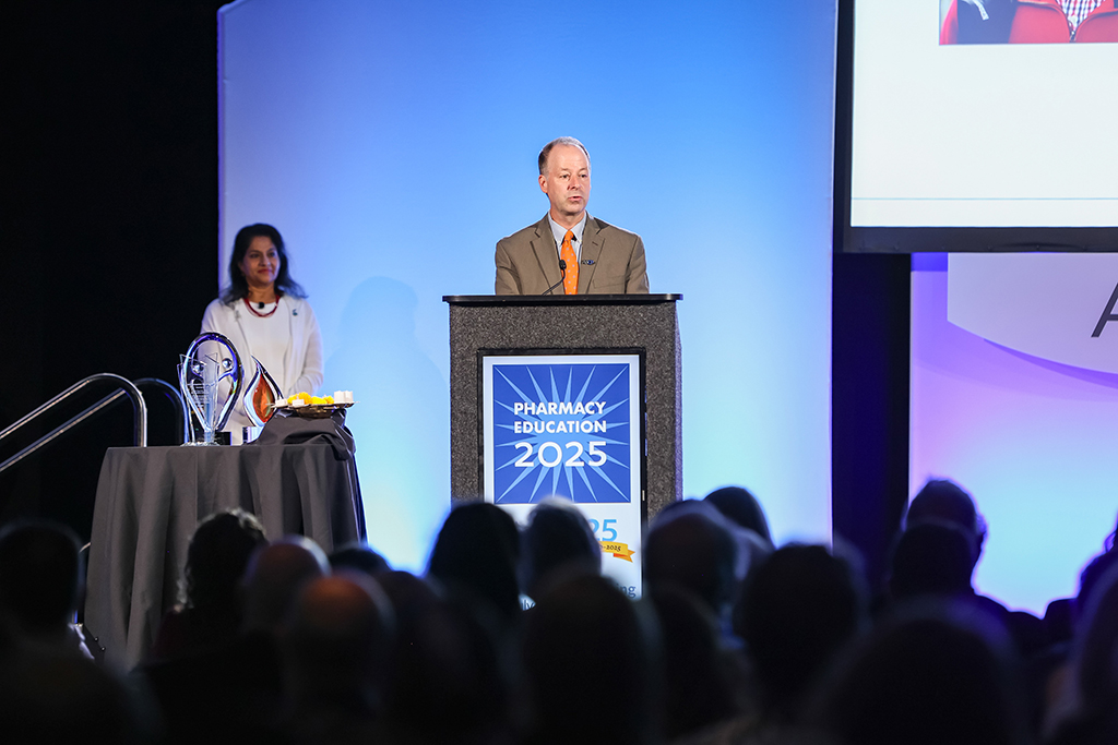 Dave Zgarrick speaks at a podium