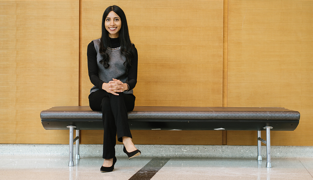 Apoorva Reddy sits on a bench