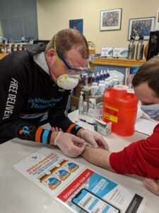 Thad Schumacher conducting a TB test