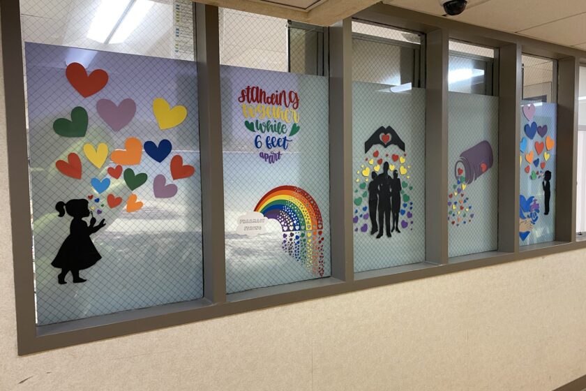Colorful paintings on the windows of an inpatient pharmacy.