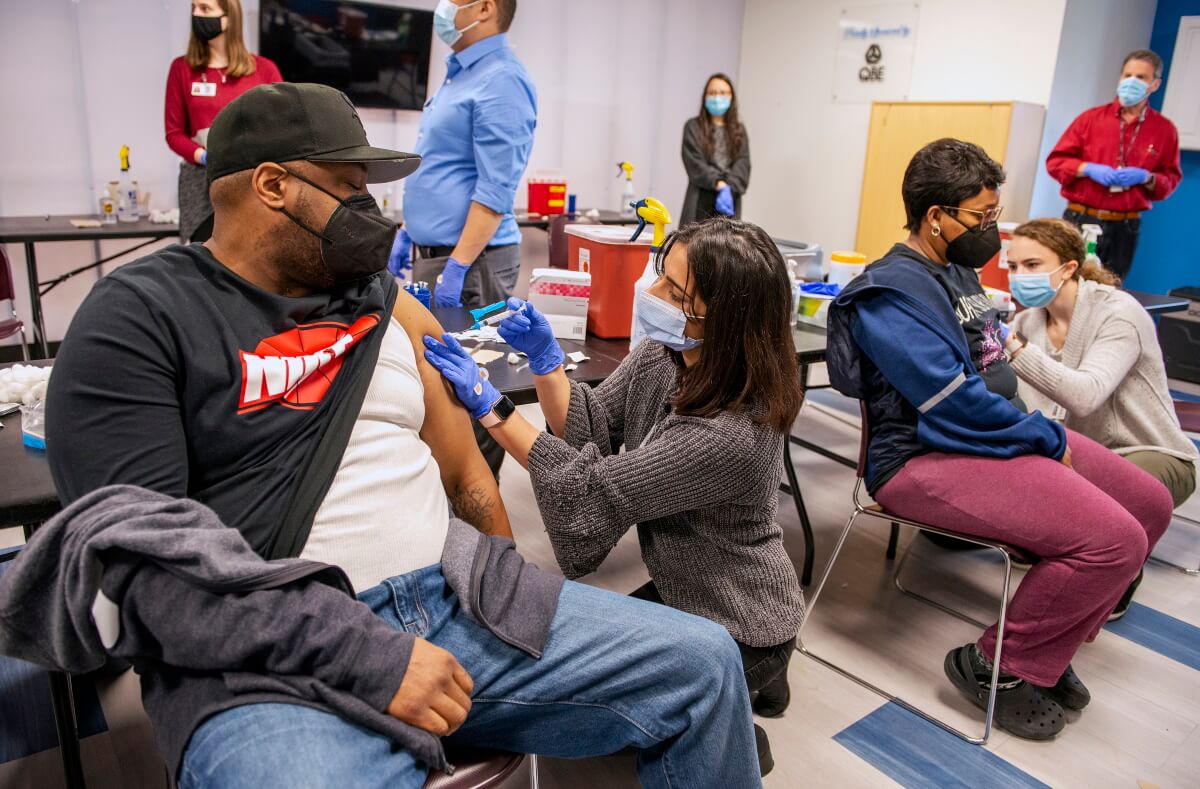 YMCA Teens supporting street vendor vaccination efforts!