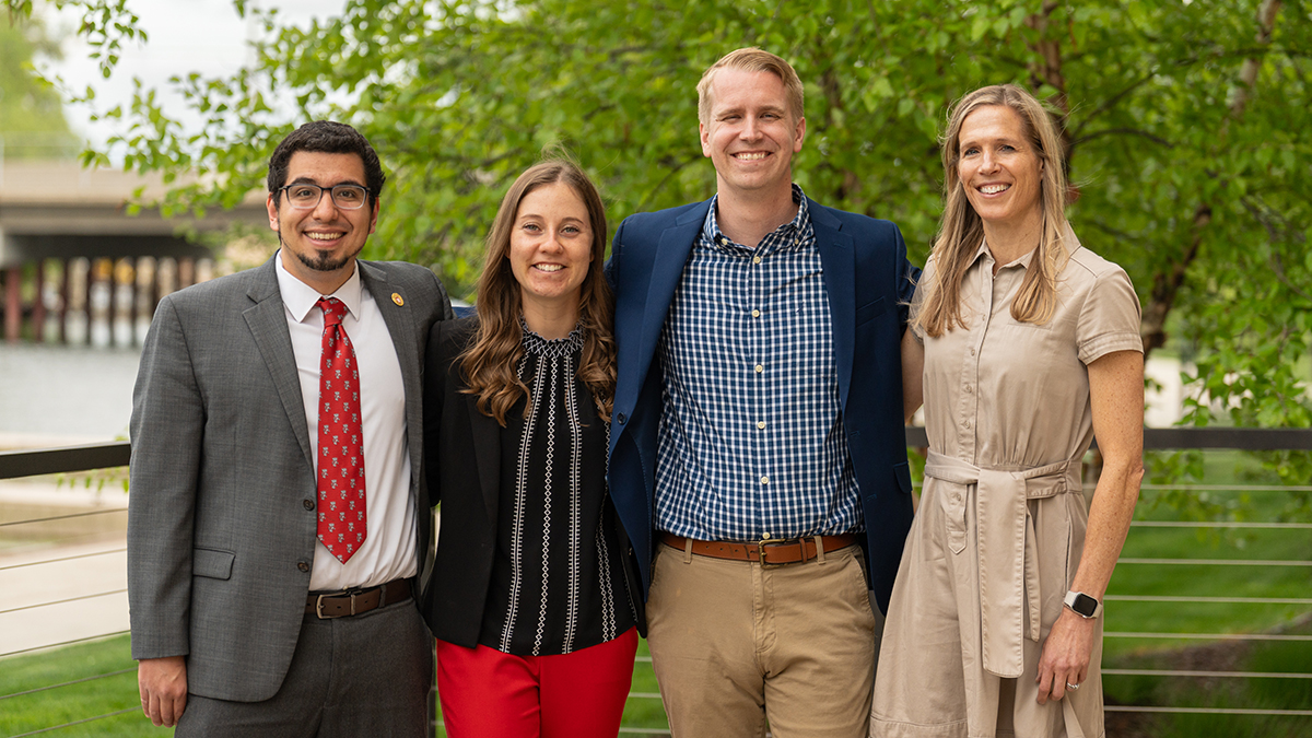 Ed Portillo, Emma Hickmann, Tyler Albright, and Susie Moroney pose for a photo outside