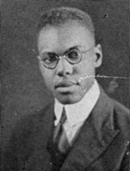 senior picture of Leo Butts in suit, tie, and glasses - from the 1920 Badger yearbook