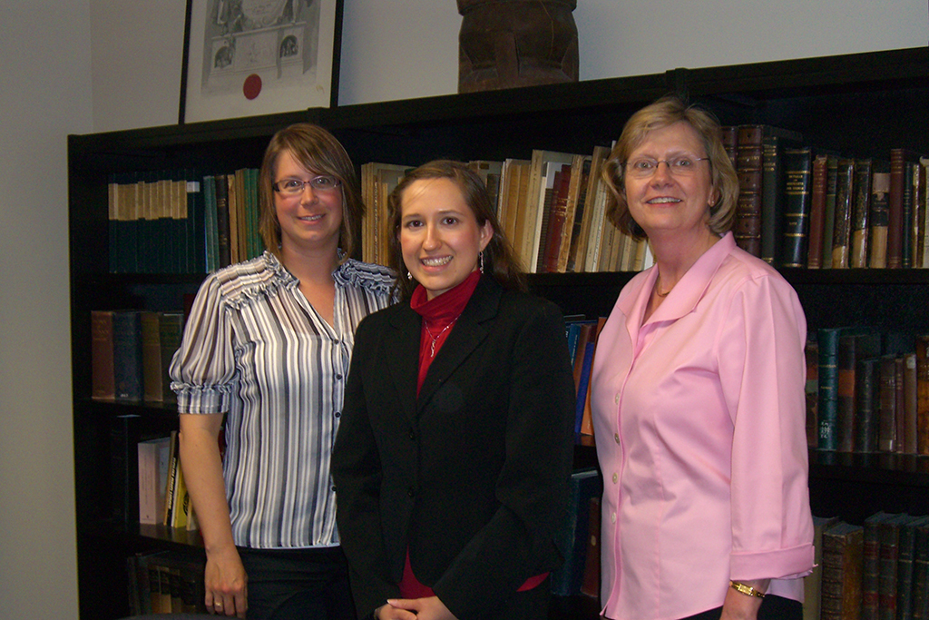Staci Williams, Jessica Battaglia, and Sue Sutter stand together for a photo