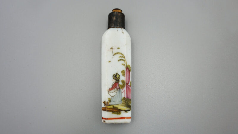 Close up of miniature perfume bottle