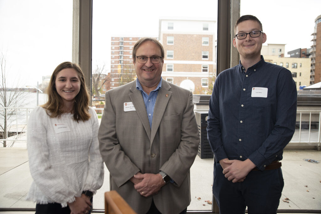 PharmD students Hannah Roskopf (left) and Cole Miller (right) with Dean Steve Swanson. | Photo by Ingrid Laas