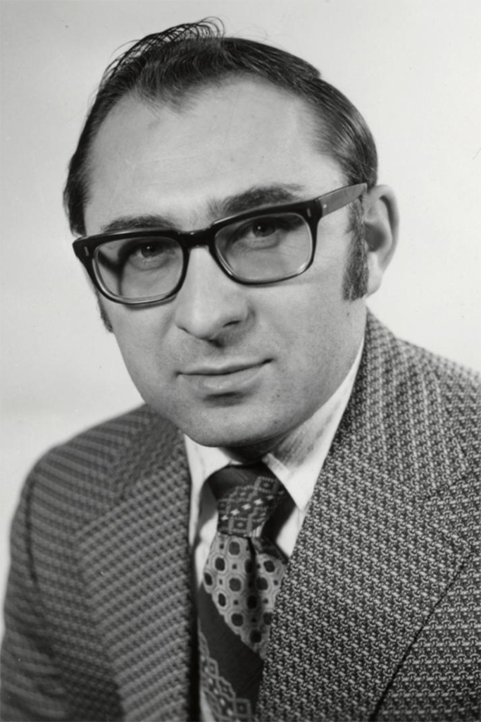 David Zilz, old black-and-white portrait, wearing dark framed glasses