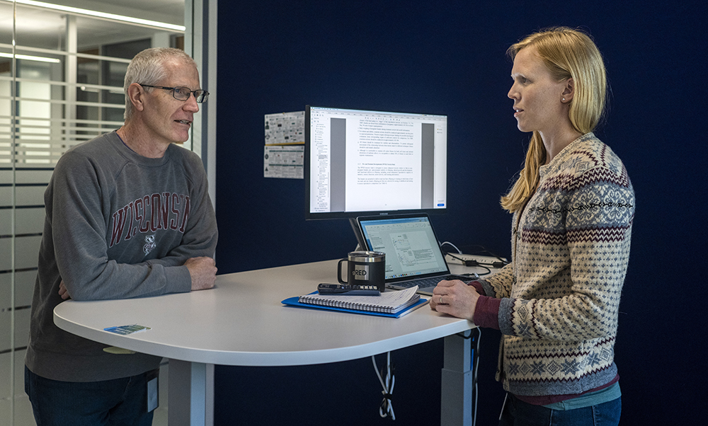 Anna Engstrom (BS '11) speaking with her manager at Genentech, Rod Prell, who is also a Badger graduate.