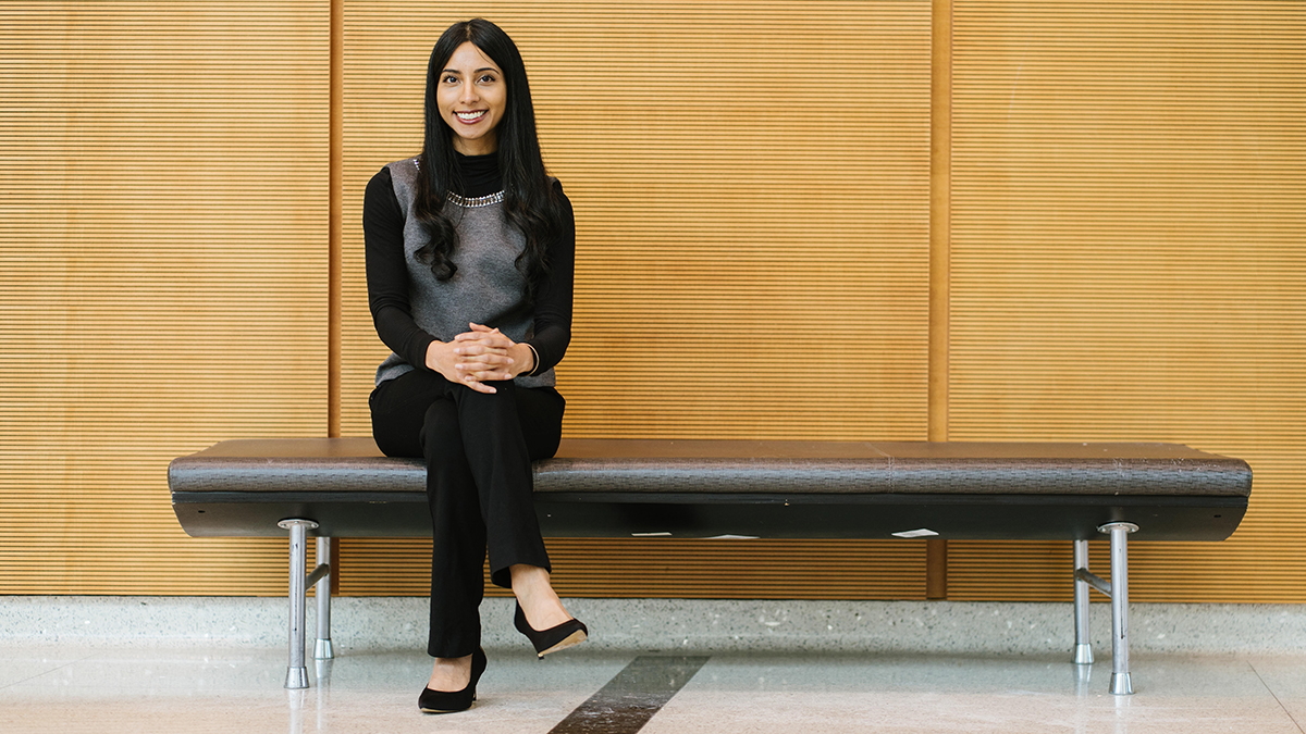Apoorva Reddy on a bench indoors