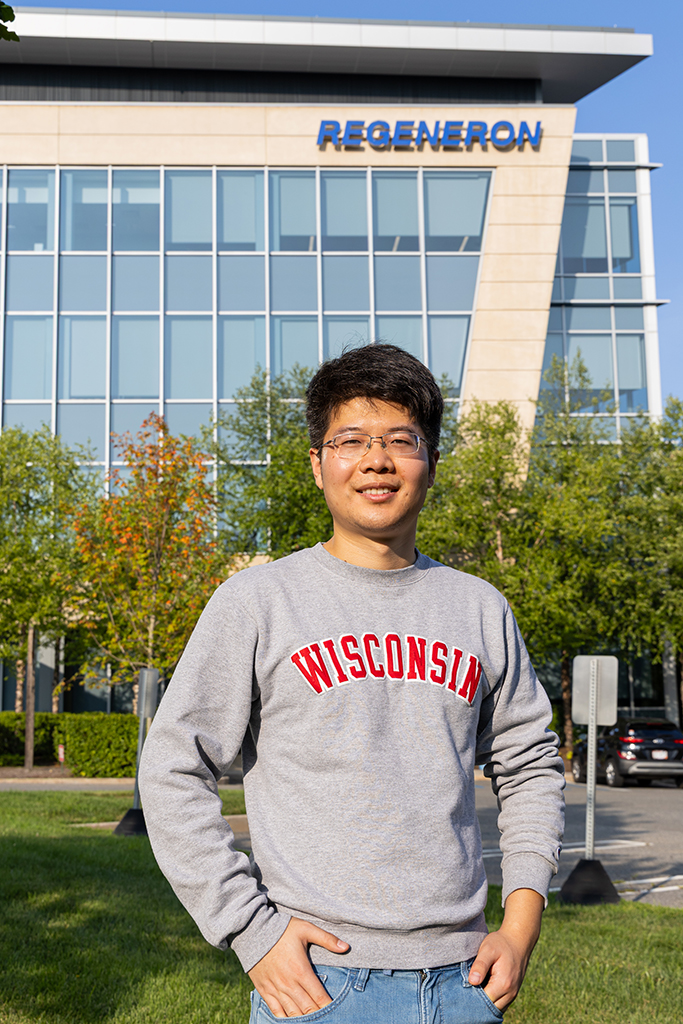 Gaoyuan Lu stands front of the Regeneron building