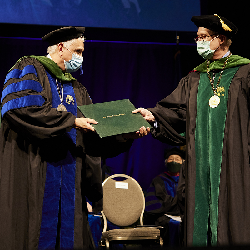 George MacKinnon III receives his degree