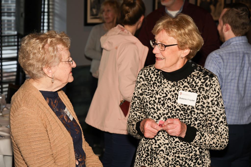 Delores Flayter and another alum speak