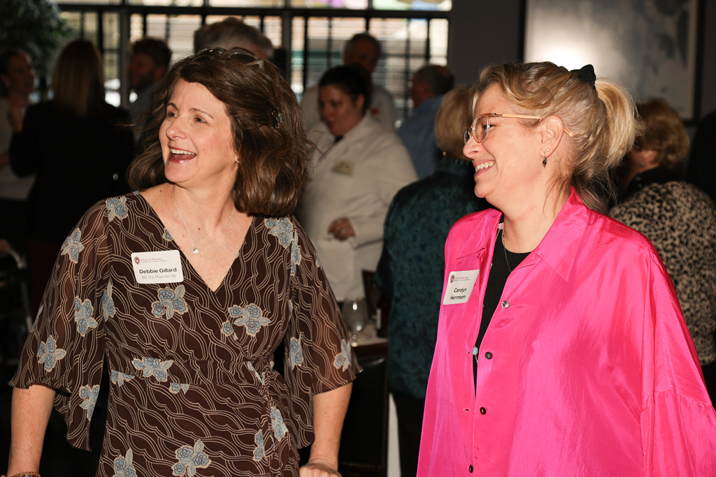 Debbie Gillard and Carolyn Hermann laugh