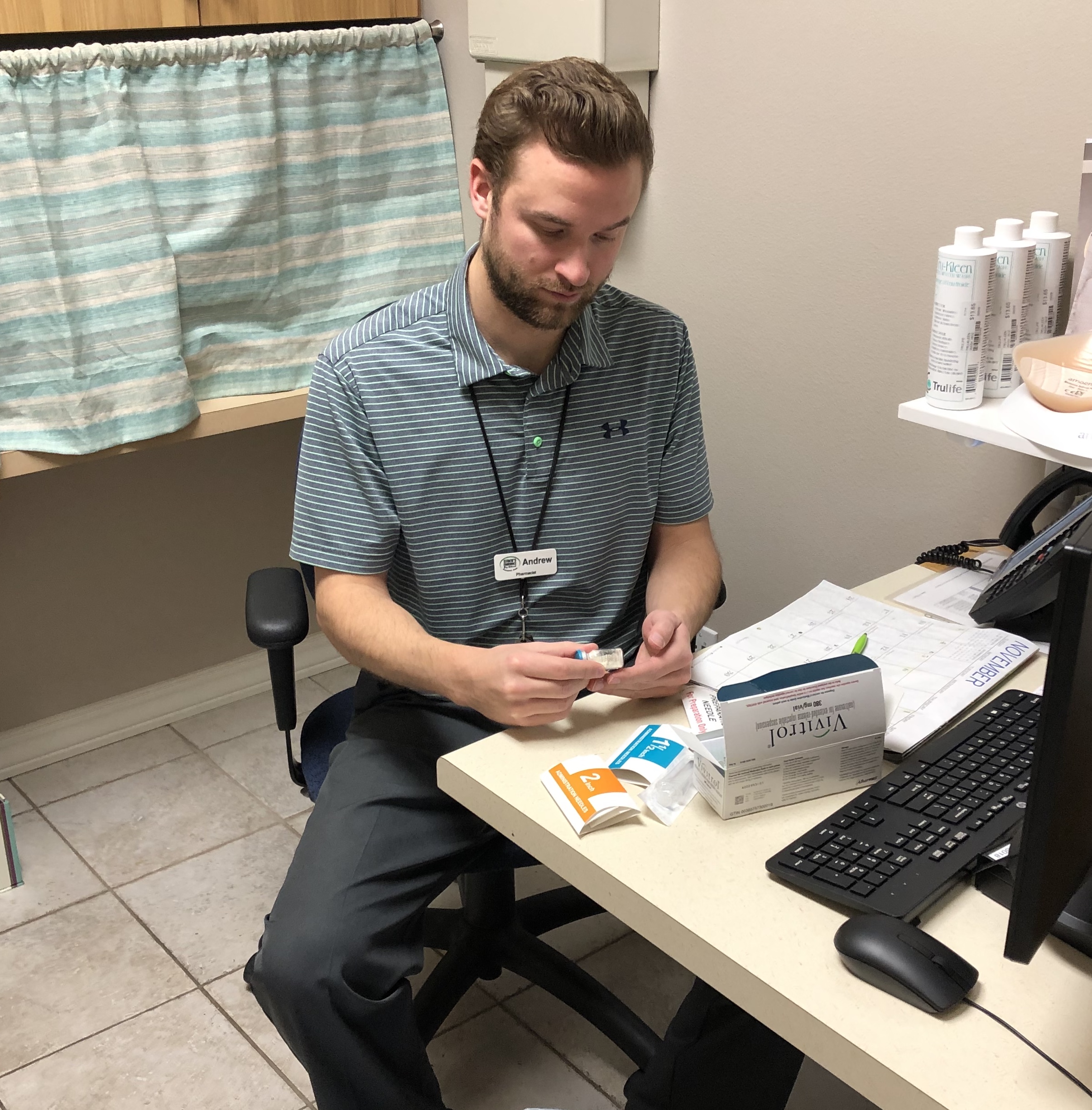 A pharmacist preparing the a naltrexone injection at Streu's Pharmacy in Green Bay.