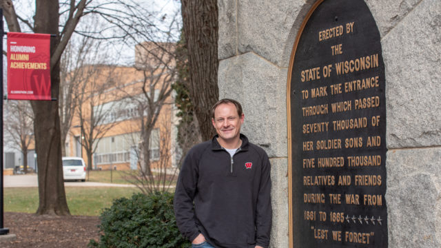 Jason Lau at the Camp Randall Memorial Arch