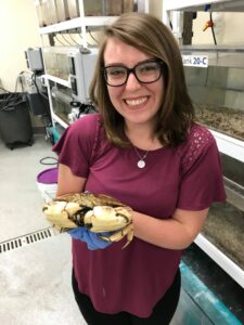 Kellen Delaney holding a crab