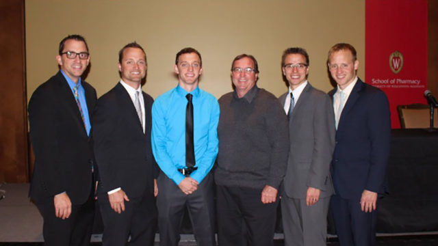 Justin, Derek, Paul, Bryan, and Jonathan Konkol with their father.