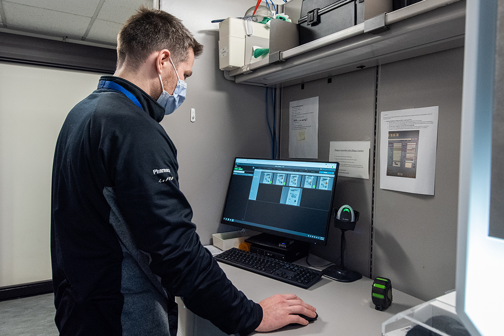 Nate Menninga works at a computer