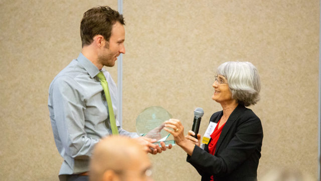 Paul Jest receiving his award from Mara Kieser