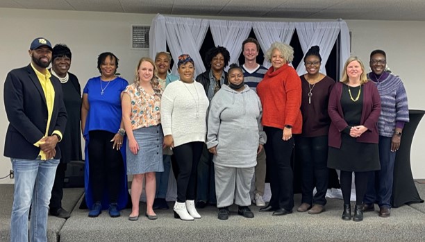 Participants, Group Facilitators and Peer Ambassadors, Dr. Mubanga, a physician who led one of the group sessions, Luke Schwerer (current DPH-4, a member of our research group) and the Shiyanbola research team.