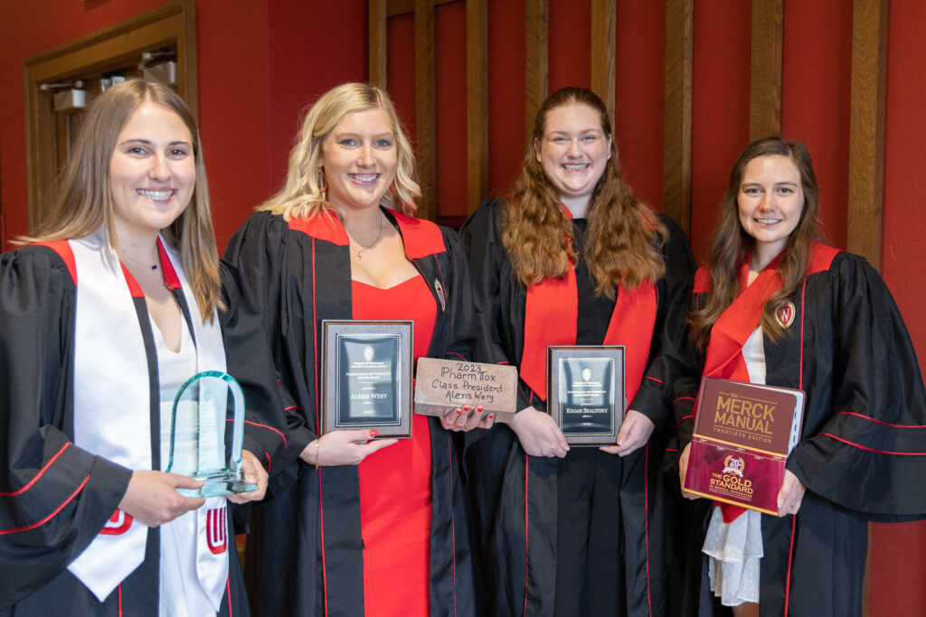 PharmTox students pose with their awards.