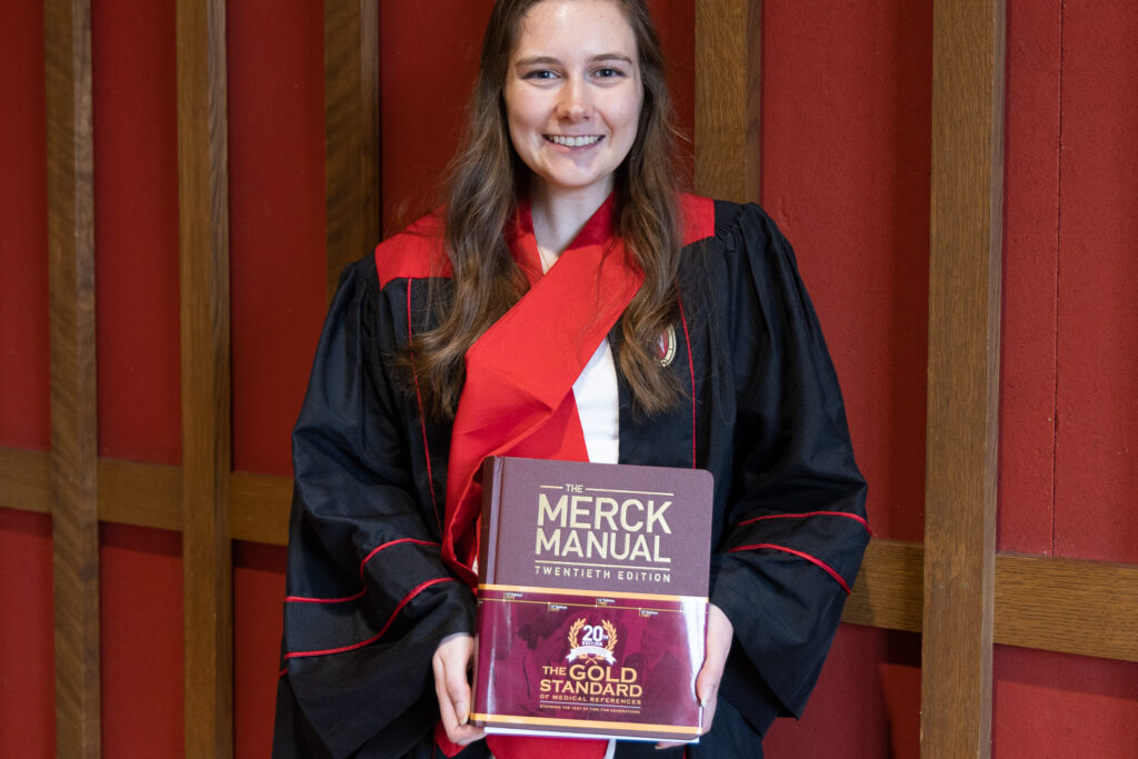 A PharmTox student with her Merck Manual award.