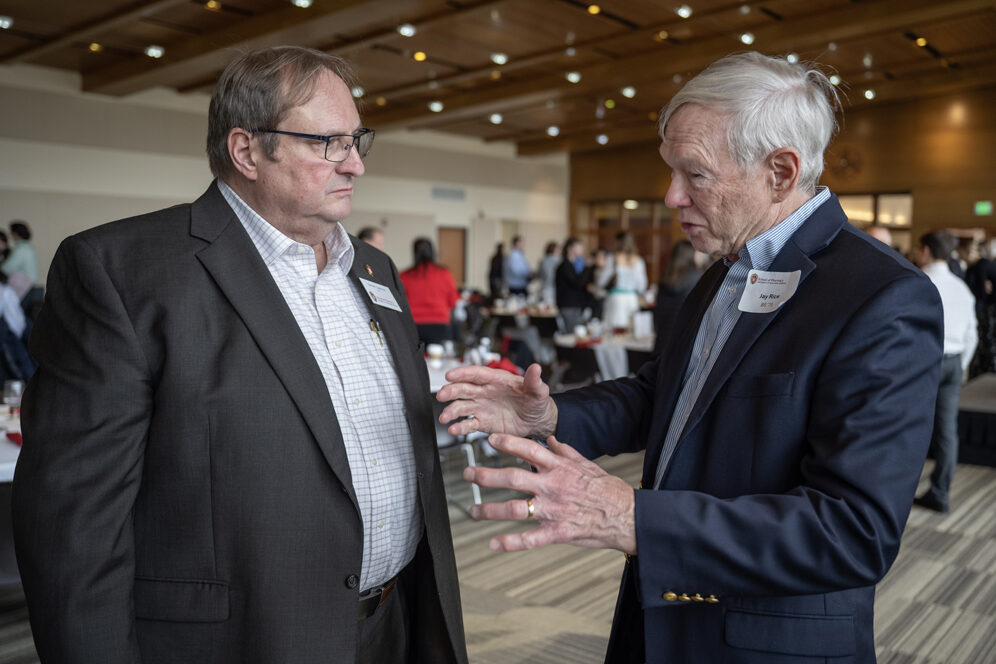 Steve Swanson speaks with donor Jay Rice.