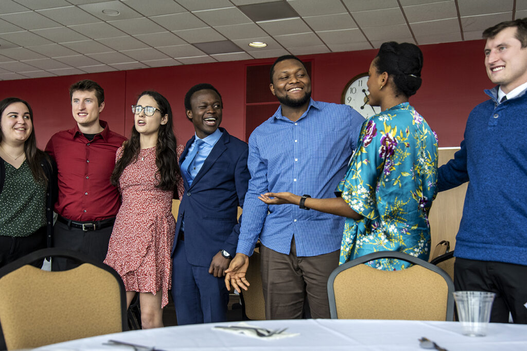 PharmD students grab a photo op after the School of Pharmacy Scholarship Brunch on April 10, 2022. L to R: Maddy Szubert, McKay Carstens, Caroline Paley, Vincent Elijah, Michael Nome, Maria Hill, and Kane Carstens.