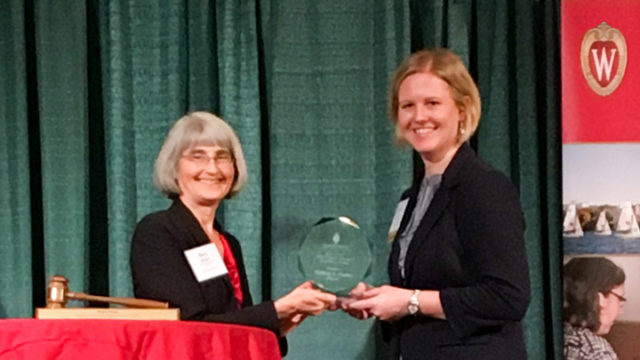 Melissa Forbes accepts award