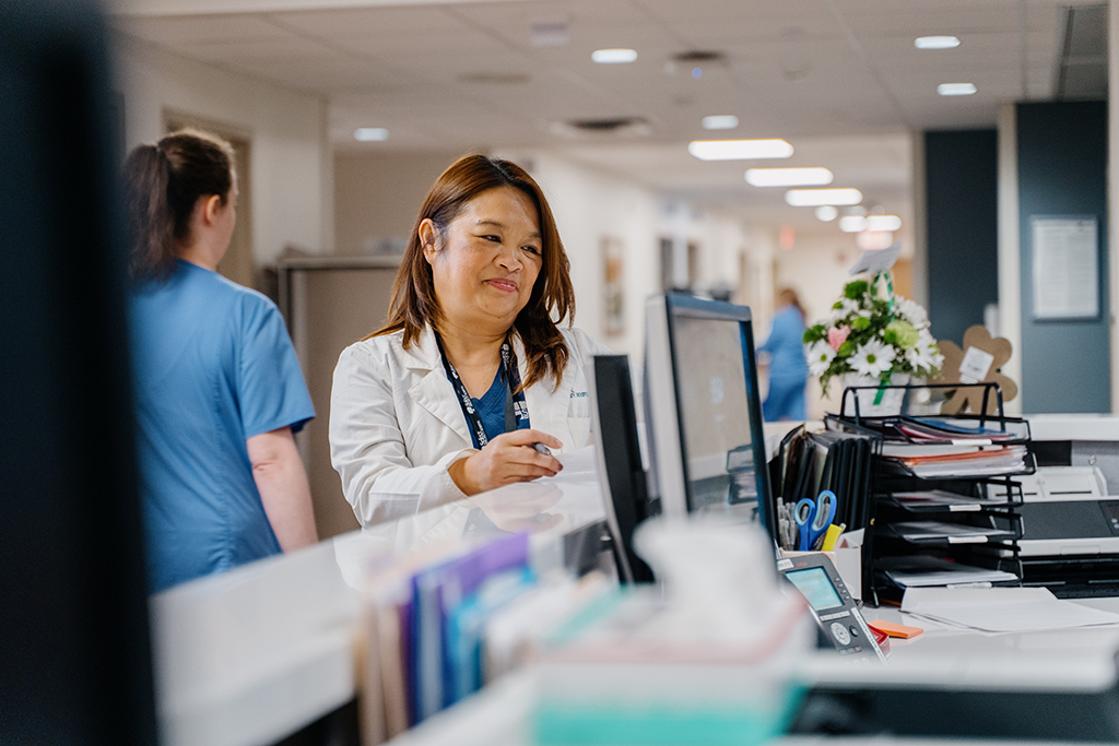 Sirada Jones by a counter in a hospital setting