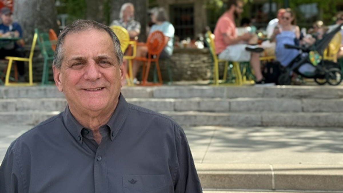 Steven Marcus poses by the Memorial Union Terrace