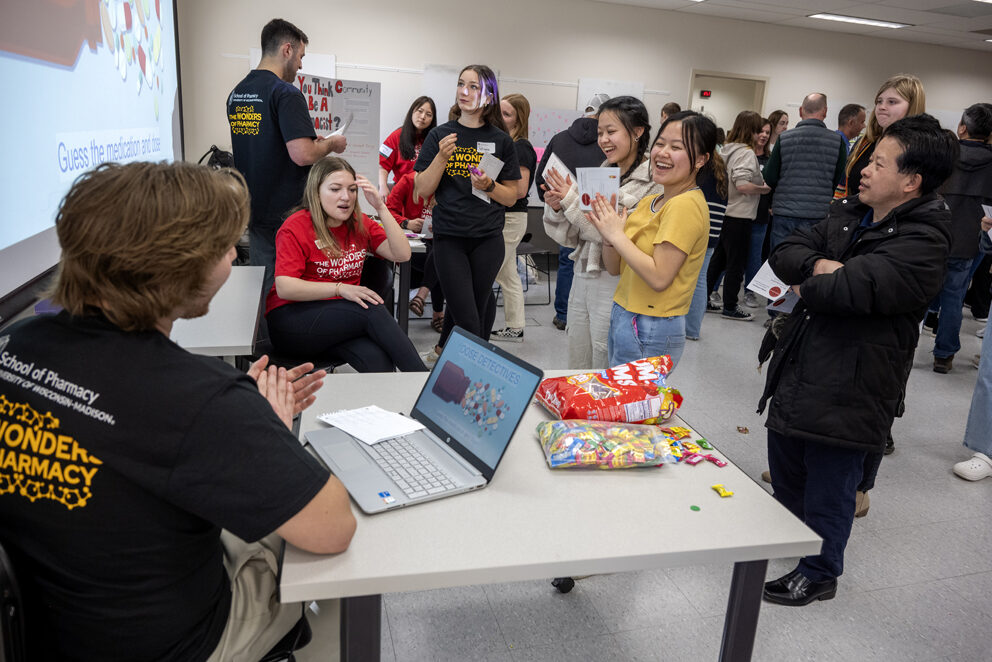 Alla Vang and Megan Vang (right) try their luck with the Dose Detectives game during the Wonders of Pharmacy on Saturday, March 2, 2024, at the School of Pharmacy on the campus of UW-Madison. (Photo Paul L. Newby, II)