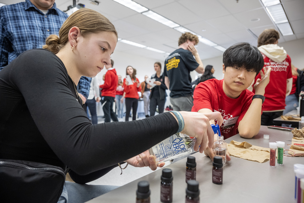 Ava Kopp prepares to create her scented hand sanitizer while trying out the Compounding Crazies activity during the Wonders of Pharmacy on Saturday, March 2, 2024, at the School of Pharmacy on the campus of UW-Madison. (Photo Paul L. Newby, II)