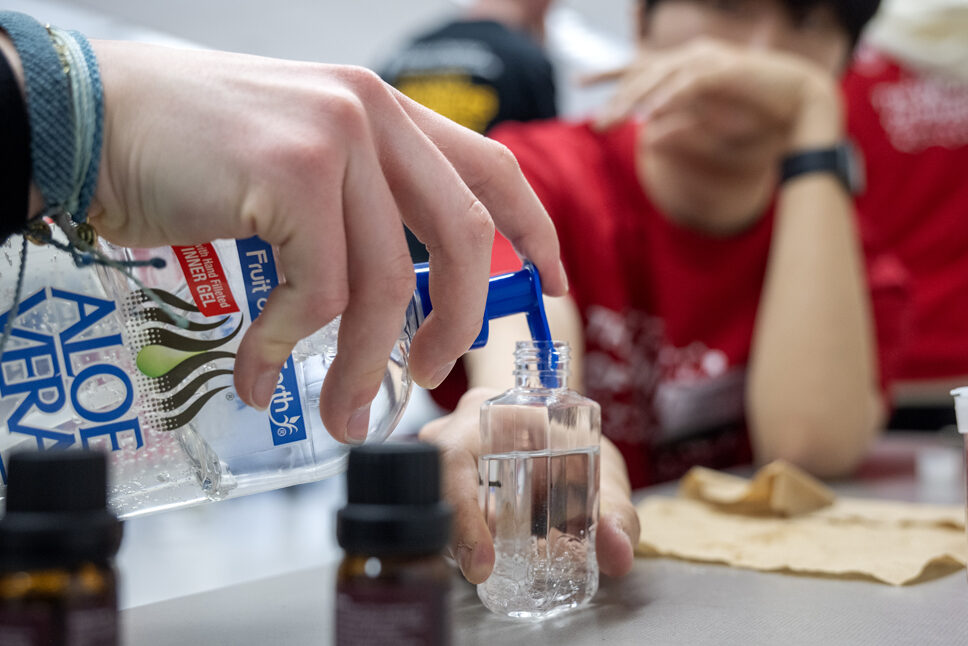 Ava Kopp prepares to create her scented hand sanitizer while trying out the Compounding Crazies activity during the Wonders of Pharmacy on Saturday, March 2, 2024, at the School of Pharmacy on the campus of UW-Madison. (Photo Paul L. Newby, II)