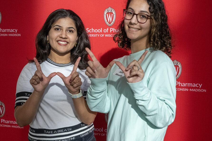 After a busy and fantastic day of exploring, Jiya Naik, left, and her friend Jana Alhniti grab a photo during the Wonders of Pharmacy on Saturday, March 2, 2024, at the School of Pharmacy on the campus of UW-Madison. (Photo Paul L. Newby, II)