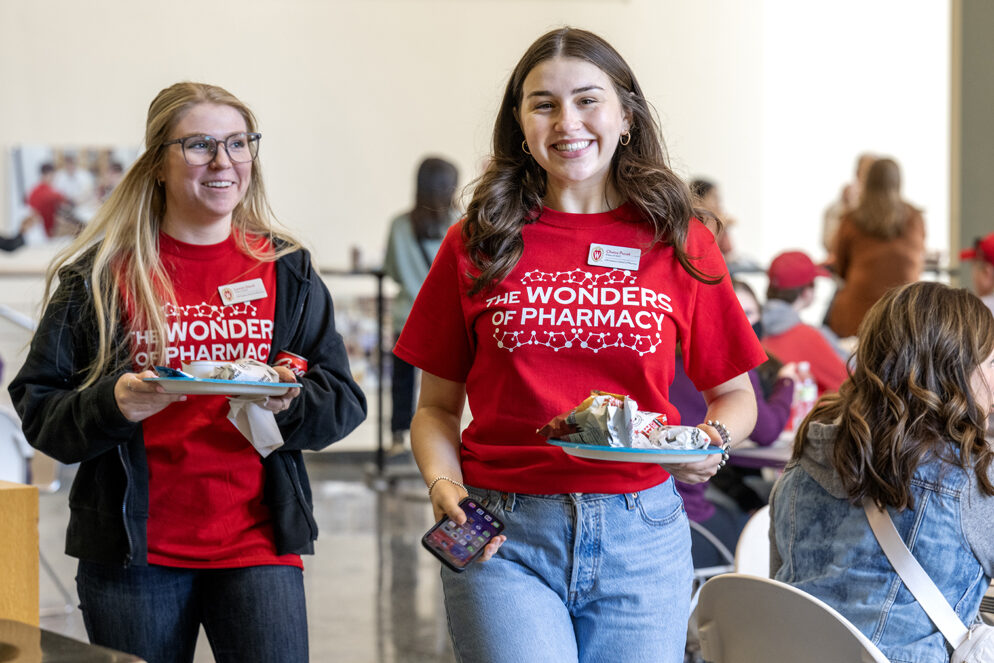 First-year PharmD student Chaise Pucek and classmate grab a little lunch before the start of the Wonders of Pharmacy on Saturday, March 2, 2024, at the School of Pharmacy on the campus of UW-Madison. (Photo Paul L. Newby, II)