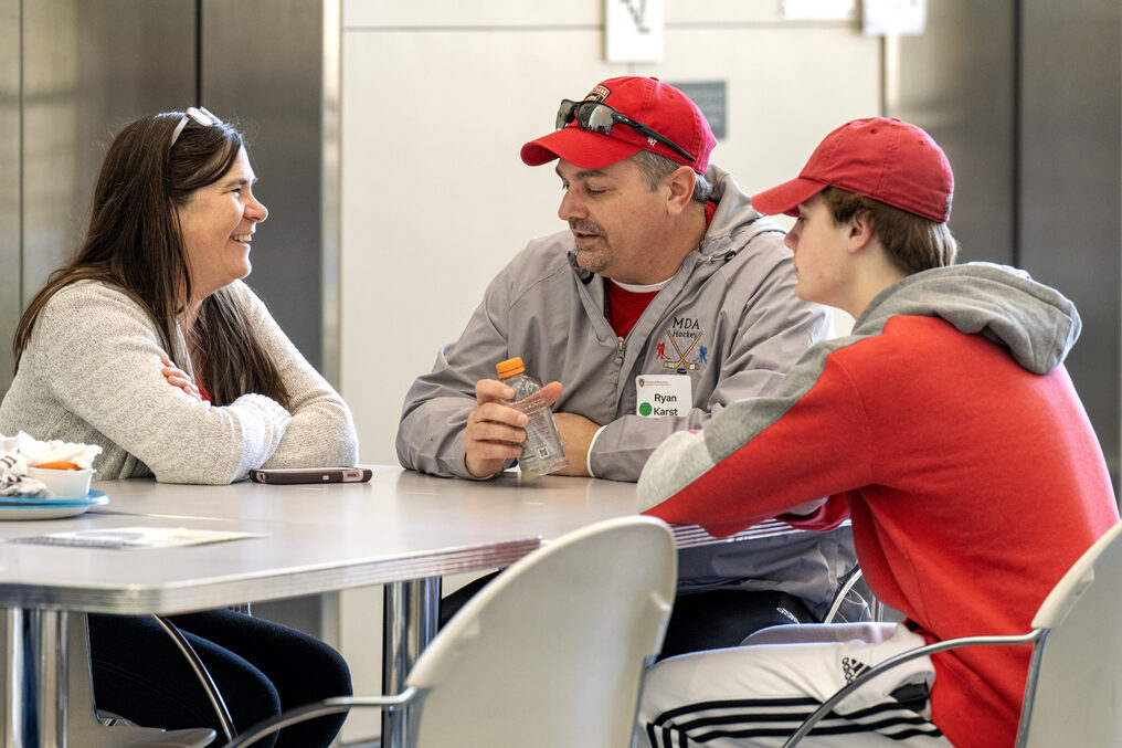 Aiden Karst talks with his parents, Ryan and Heather Karst, during lunch before the start of the Wonders of Pharmacy on Saturday, March 2, 2024, at the School of Pharmacy on the campus of UW-Madison. (Photo Paul L. Newby, II)