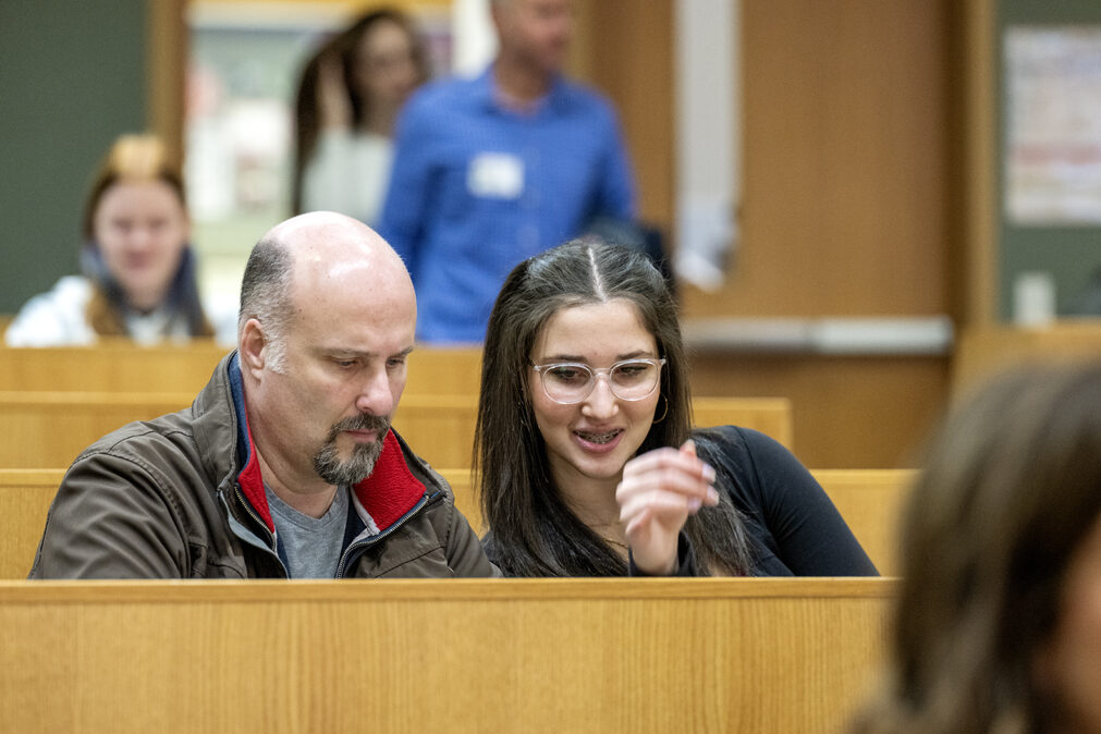 Paolo Sali looks over the activity stations with his daughter Rosalia Sali during the start of the Wonders of Pharmacy event on Saturday, March 2, 2024, at the School of Pharmacy on the campus of UW-Madison. (Photo Paul L. Newby, II)