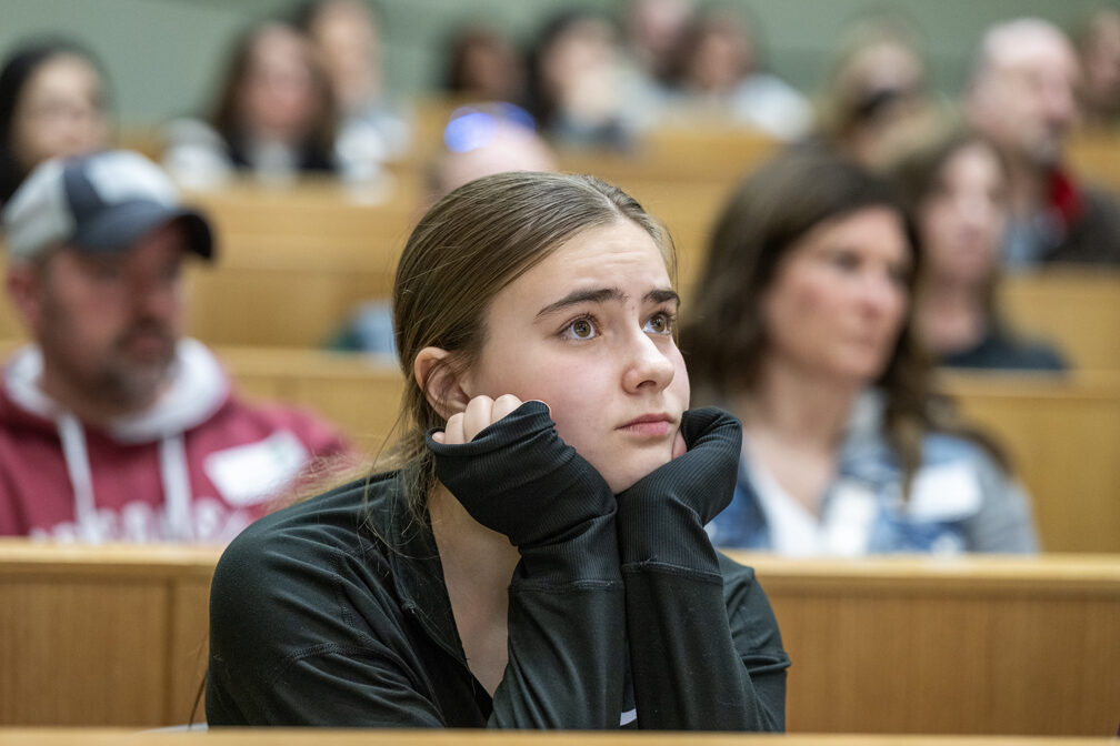 High schooler Lizzy Mesenberg listens as Professor Dr. Olufunmilola Abraham talks about the Wonders of Pharmacy activities on Saturday, March 2, 2024, at the School of Pharmacy on the campus of UW-Madison. (Photo Paul L. Newby, II)