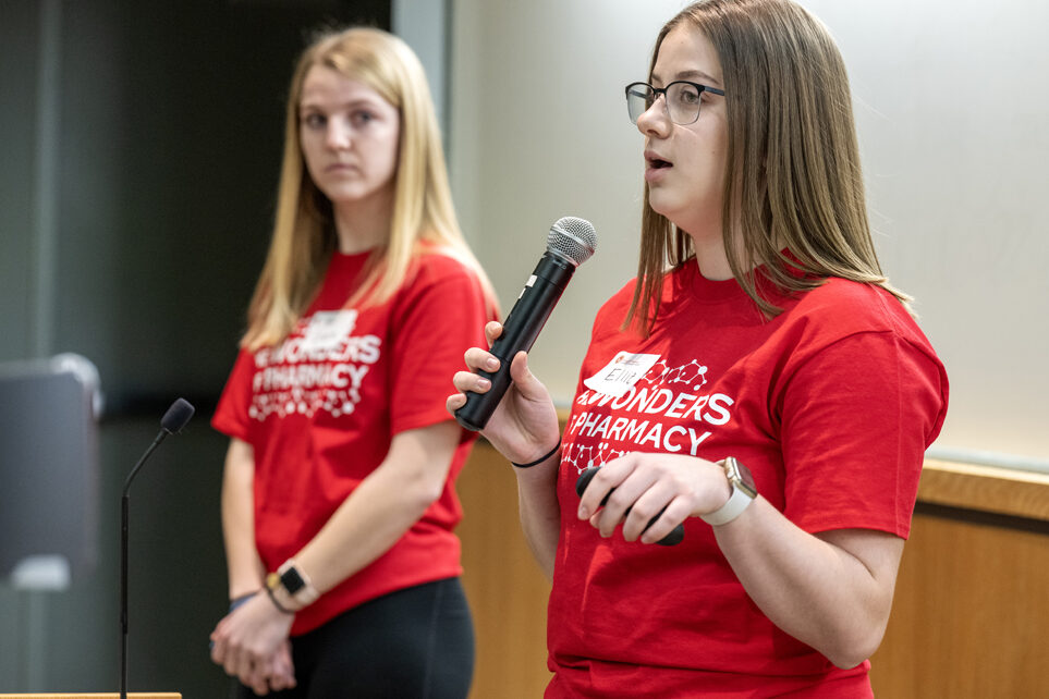 PharmD student Ellie Maday talks to the audience as they explain the Dance is Medicine CRoME lab activity during the Wonders of Pharmacy activities on Saturday, March 2, 2024, at the School of Pharmacy on the campus of UW-Madison. (Photo Paul L. Newby, II)