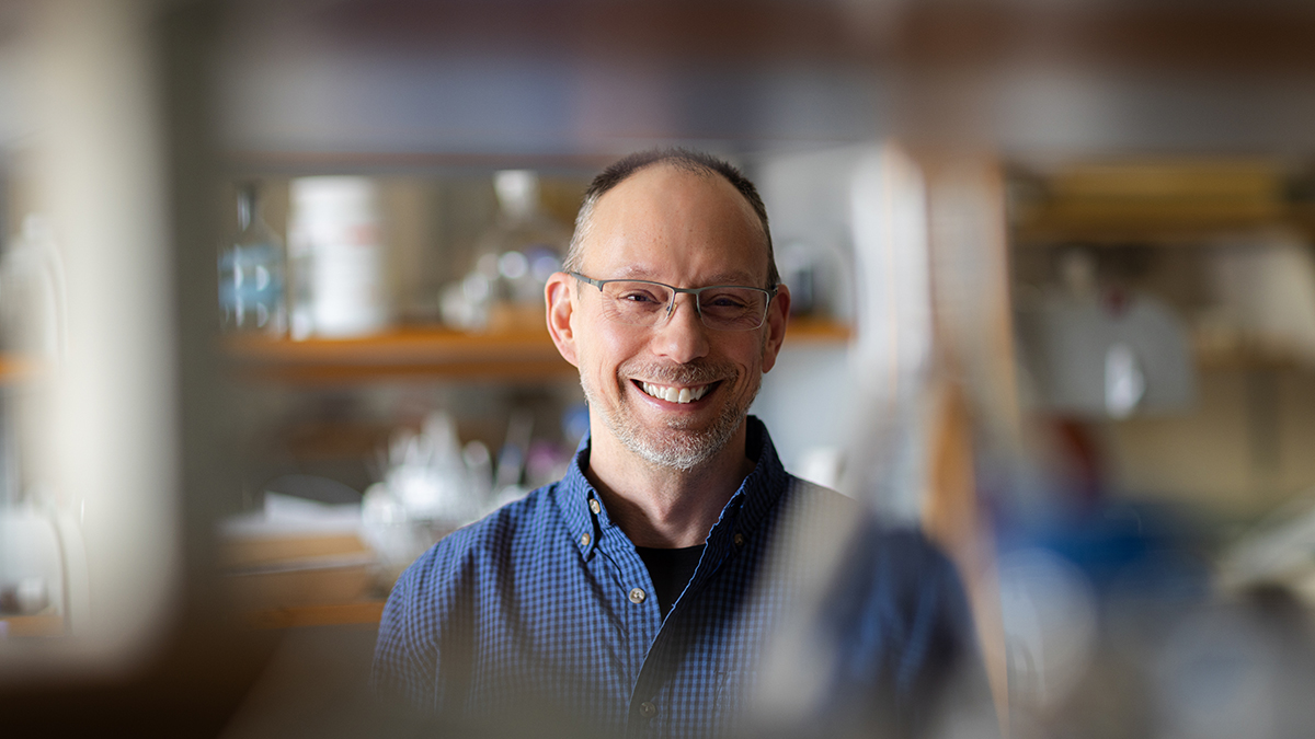 Tim Bugni smiles in his lab