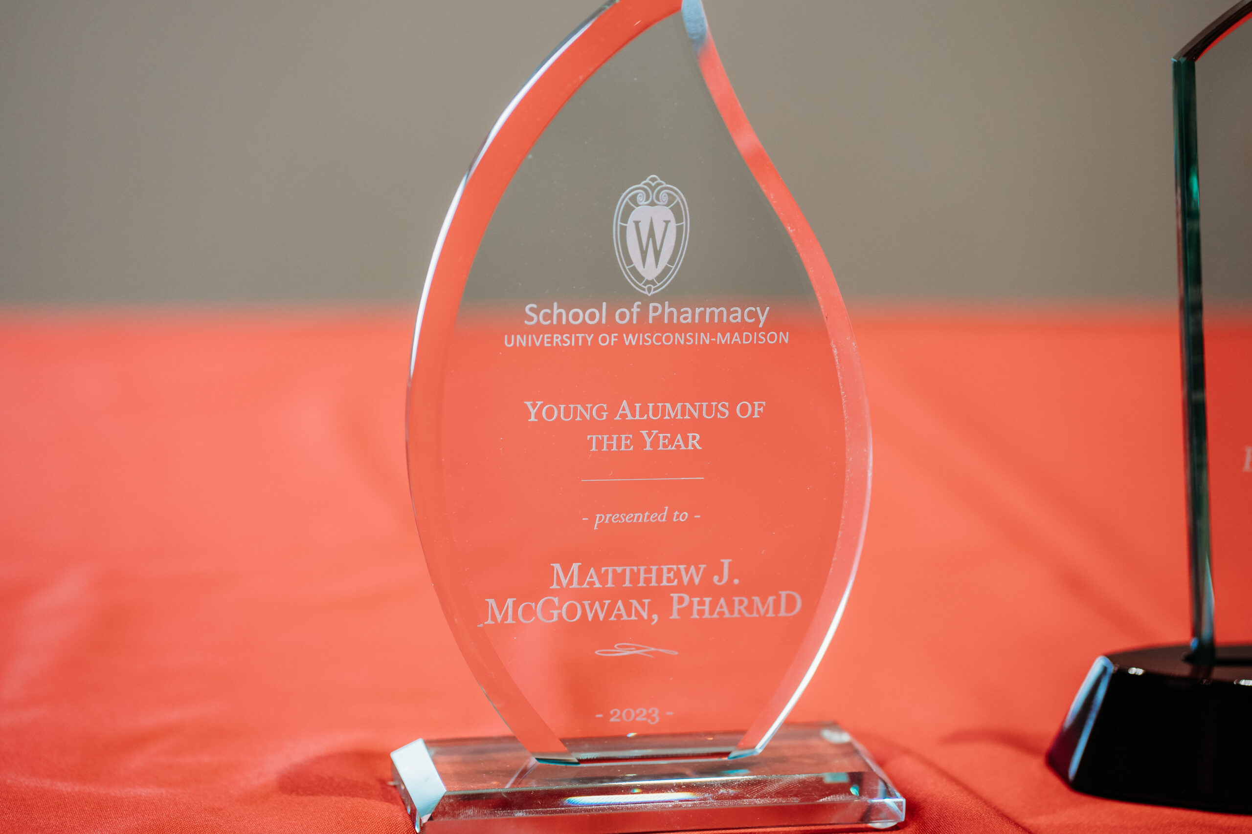 A glass Young Alumnus of the Year award for Matt McGowan.