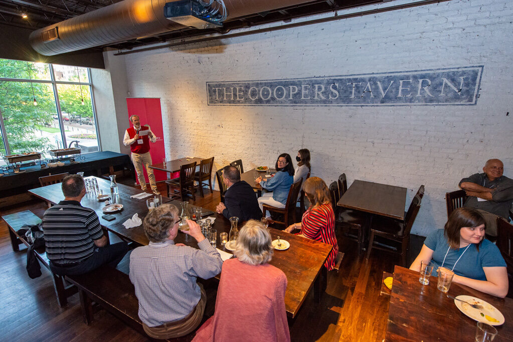 Dave Mott speaks to alumni gathering attendees at the Coopers Tavern
