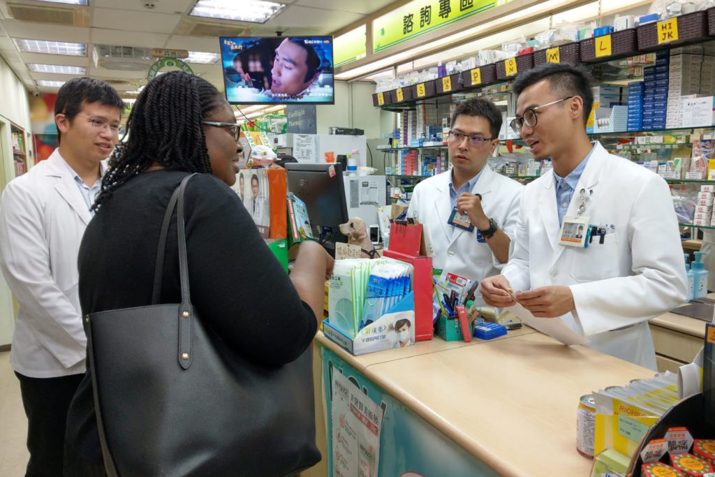Olayinka Shiyanbola visiting a local pharmacy in Taipei
