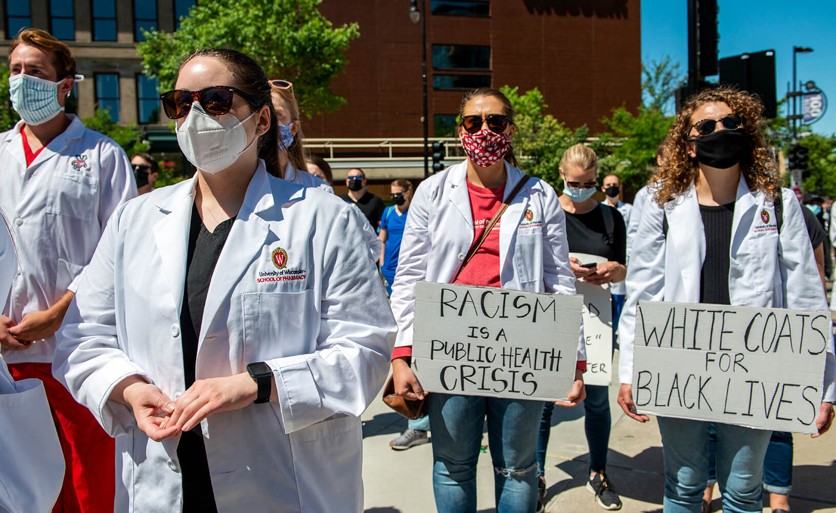 Students joining in on the white coats for black lives march