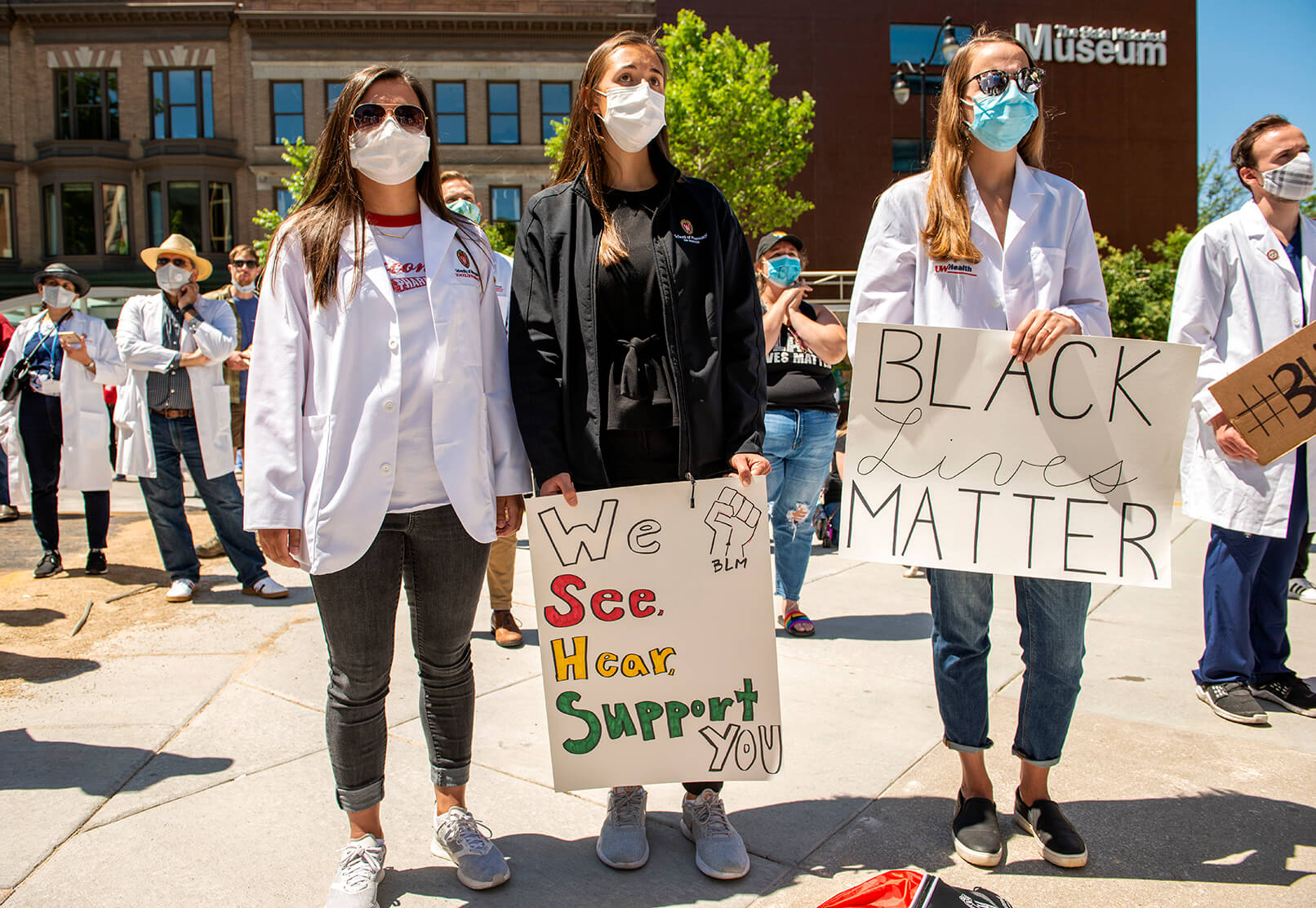 Students joining in for white coats for black lives march