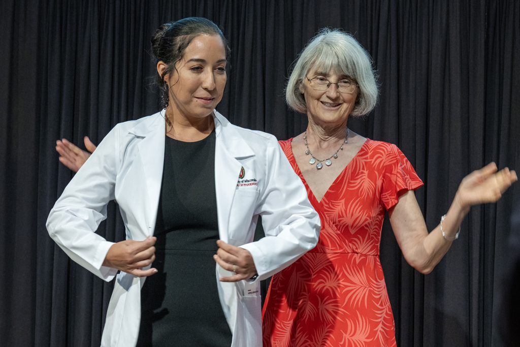 PharmD student poses with Mara Kieser after receiving her white coat